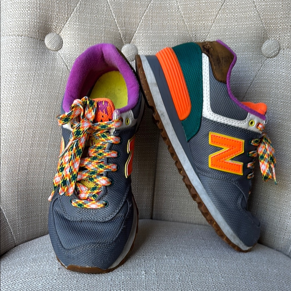New Balance 574 Gray Sneakers with Orange and Green Accents